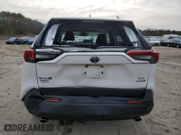 2019 Toyota RAV4 Hybrid XLE with VIN JTMRWRFV1KD004163, listed as a Copart auction lot 49701325 with 81,471 mi miles and Salvage Title. Bid and sale history available at carsss.com. Image 6.
