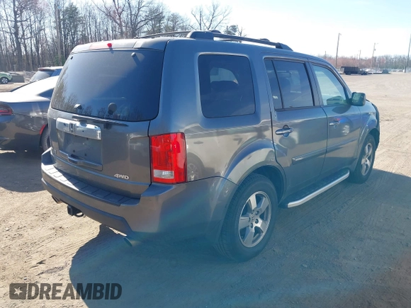 2011 Honda Pilot EX-L with VIN 5FNYF4H69BB015375, listed as a IAAI auction lot 41826235 with 199,171 mi miles and . Bid and sale history available at carsss.com. Image 4.