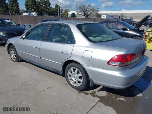 2002 Honda Accord Sdn SE with VIN JHMCG66832C011406, listed as a IAAI auction lot 41957329 with 190,495 mi miles. Bid and sale history available at carsss.com. Image 3.