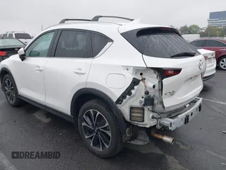 2022 Mazda CX-5 S Premium Plus with VIN JM3KFBEM6N0615083, listed as a IAAI auction lot 41907406 with 49,617 mi miles and . Bid and sale history available at carsss.com. Image 3.