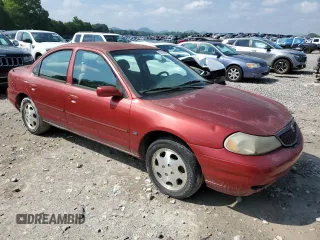 2000 Mercury Mystique GS z VIN 1MEFM6530YK615859, wystawiony jako Copart lot #59704875 z przebiegiem 259 272 mil mil oraz Szkoda całkowita • Salvage title. Historia ofert i sprzedaży dostępna na DreamBid. Obrazek 4.