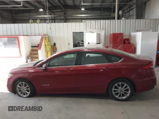 2019 Ford Fusion Hybrid SE with VIN 3FA6P0LUXKR205712, listed as a IAAI auction lot 41267049 with 124,687 mi miles. Bid and sale history available at carsss.com. Image 14.