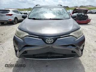 2018 Toyota RAV4 XLE with VIN JTMWFREV1JJ742694, listed as a Copart auction lot 51093695 with 74,502 mi miles and Salvage Title. Bid and sale history available at DreamBid. Image 5.
