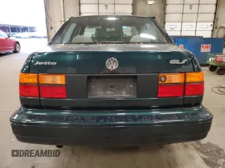 1998 Volkswagen Jetta z VIN 3VWSA81H5WM126169, wystawiony jako Copart lot #84884894 z przebiegiem 32 759 mil mil oraz Czysty tytuł • Clean title. Historia ofert i sprzedaży dostępna na DreamBid. Obrazek 6.