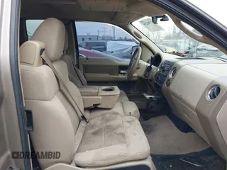 2004 Ford F-150 XLT with VIN 1FTPX14524NA34164, listed as a IAAI auction lot 41583236 with 168,780 mi miles. Bid and sale history available at carsss.com. Image 5.