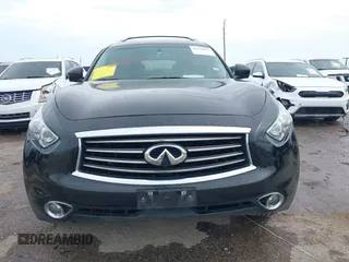 2014 Infiniti QX70 z VIN JN8CS1MU6EM450640, wystawiony jako IAAI lot #42335811 z przebiegiem 143 565 mil mil oraz . Historia ofert i sprzedaży dostępna na DreamBid. Obrazek 13.