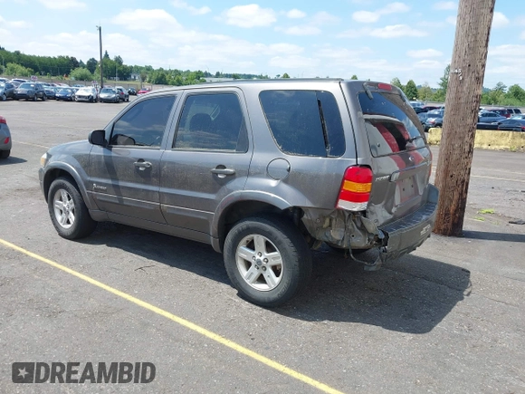 2006 Ford Escape Hybrid z VIN 1FMCU96H86KA52519, wystawiony jako IAAI lot #42443003 z przebiegiem 162 469 mil mil oraz . Historia ofert i sprzedaży dostępna na DreamBid. Obrazek 3.