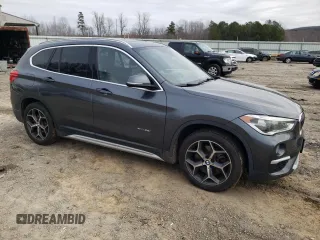 2016 BMW X1 xDrive28i with VIN WBXHT3C39G5E48970, listed as a Copart auction lot 43343365 with 144,329 mi miles and Salvage Title. Bid and sale history available at carsss.com. Image 4.