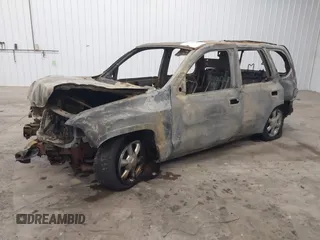 2005 GMC Envoy SLT z VIN 1GKDT13S752254350, wystawiony jako IAAI lot #41301432 z przebiegiem Nie podano mil oraz . Historia ofert i sprzedaży dostępna na DreamBid. Obrazek 2.