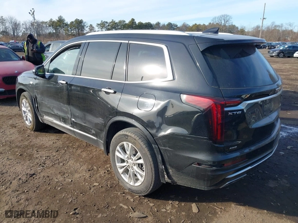 2023 Cadillac XT6 Luxury with VIN 1GYKPBR41PZ136918, listed as a IAAI auction lot 41417724 with 57,949 mi miles. Bid and sale history available at carsss.com. Image 14.