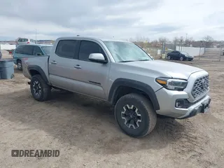 2023 Toyota Tacoma 4WD SR with VIN 3TMCZ5AN0PM609672, listed as a IAAI auction lot 41830191 with 24,244 mi miles. Bid and sale history available at carsss.com. Image 1.