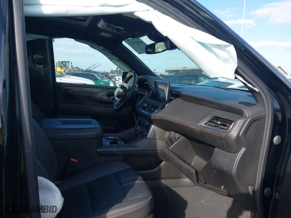 2023 Chevrolet Tahoe RST with VIN 1GNSCRKD3PR468757, listed as a IAAI auction lot 41557004 with 57,384 mi miles. Bid and sale history available at carsss.com. Image 5.