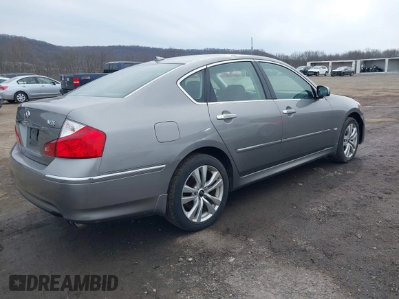 2010 Infiniti M with VIN JN1CY0AR0AM960483, listed as a IAAI auction lot 41619095 with 81,690 mi miles. Bid and sale history available at carsss.com. Image 4.