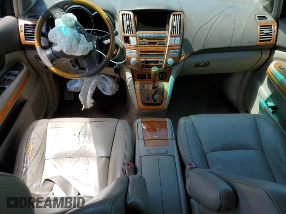 2005 Lexus RX 330 z VIN 2T2GA31UX5C031926, wystawiony jako Copart lot #57992015 z przebiegiem 216 623 mil mil oraz Szkoda całkowita • Salvage title. Historia ofert i sprzedaży dostępna na DreamBid. Obrazek 8.