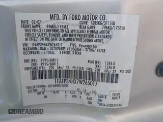 2007 Ford Focus S with VIN 1FAFP34NX7W265017, listed as a IAAI auction lot 42415556 with 71,840 mi miles and . Bid and sale history available at DreamBid. Image 9.