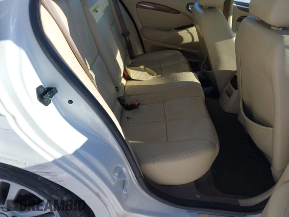 2005 Jaguar S-Type with VIN SAJWA01T75FN17656, listed as a IAAI auction lot 41282140 with 126,631 mi miles and . Bid and sale history available at DreamBid. Image 8.