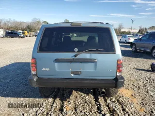 1998 Jeep Cherokee Sport with VIN 1J4FT68S0WL138603, listed as a Copart auction lot 86766454 with 0 mi miles and Salvage Title. Bid and sale history available at carsss.com. Image 6.