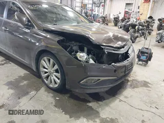 2015 Hyundai Azera Limited z VIN KMHFH4JG2FA432545, wystawiony jako IAAI lot #41329236 z przebiegiem 98 661 mil mil oraz . Historia ofert i sprzedaży dostępna na DreamBid. Obrazek 6.