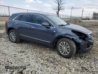 2018 Cadillac XT5 Luxury FWD with VIN 1GYKNCRSXJZ174729, listed as a Copart auction lot 51893295 with 71,400 mi miles and Salvage Title. Bid and sale history available at carsss.com. Image 4.
