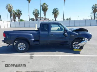 2000 Ford Ranger XL with VIN 1FTYR14V4YPB92188, listed as a IAAI auction lot 41967651 with 297,603 mi miles. Bid and sale history available at carsss.com. Image 13.