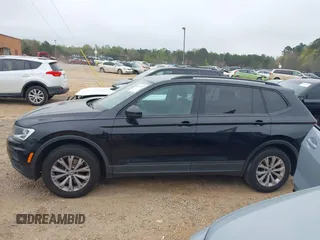 2018 Volkswagen Tiguan S with VIN 3VV0B7AX4JM098495, listed as a IAAI auction lot 41937757 with 179,168 mi miles and . Bid and sale history available at DreamBid. Image 14.