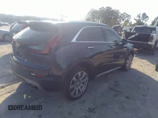 2019 Cadillac XT4 FWD Premium Luxury with VIN 1GYFZCR41KF202167, listed as a IAAI auction lot 35653161 with 64,132 mi miles and . Bid and sale history available at DreamBid. Image 4.