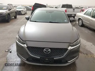 2020 Mazda 6 Signature with VIN JM1GL1XY6L1522900, listed as a IAAI auction lot 41724818 with 62,846 mi miles and . Bid and sale history available at DreamBid. Image 12.