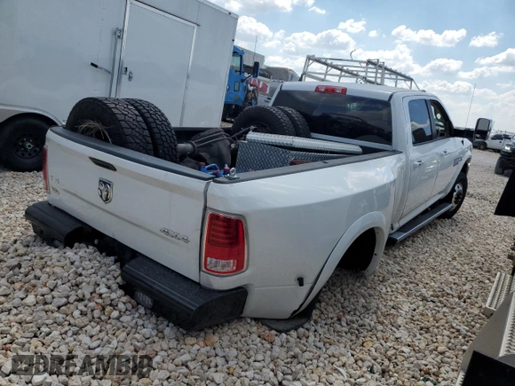 2015 Ram 3500 Laramie with VIN 3C63RRJL1FG625356, listed as a Copart auction lot 73058614 with 198,702 mi miles and Salvage Title. Bid and sale history available at carsss.com. Image 3.