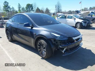 2024 Tesla Model Y Performance with VIN 7SAYGDEF1RA329825, listed as a IAAI auction lot 41762602 with 3,923 mi miles and . Bid and sale history available at DreamBid. Image 1.
