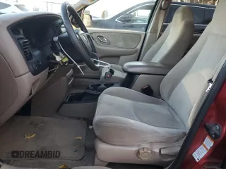 2001 Mazda Tribute LX with VIN 4F2CU08111KM19933, listed as a Copart auction lot 81174614 with 209,736 mi miles and Salvage Title. Bid and sale history available at DreamBid. Image 7.