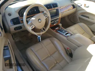 2007 Jaguar XK with VIN SAJDA44B075B06208, listed as a Copart auction lot 82694984 with 74,003 mi miles and Salvage Title. Bid and sale history available at carsss.com. Image 8.