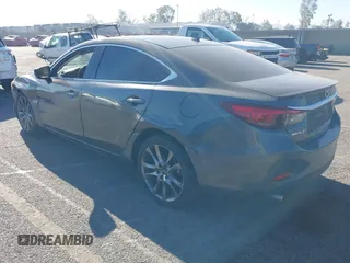 2017 Mazda 6 Grand Touring with VIN JM1GL1W51H1137470, listed as a IAAI auction lot 41872756 with 132,564 mi miles. Bid and sale history available at carsss.com. Image 3.