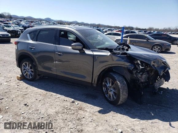 2020 Mazda CX-5 Grand Touring with VIN JM3KFADM4L0748126, listed as a Copart auction lot 50018615 with Not Provided miles and Salvage Title. Bid and sale history available at carsss.com. Image 4.