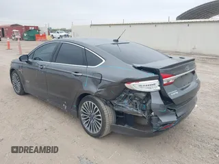 2017 Ford Fusion Titanium with VIN 3FA6P0SU8HR104727, listed as a IAAI auction lot 41242482 with 83,021 mi miles and . Bid and sale history available at DreamBid. Image 3.
