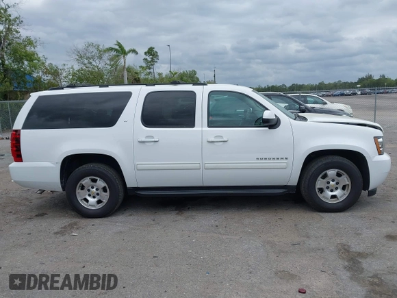 2014 Chevrolet Suburban LT with VIN 1GNSCJE06ER231476, listed as a IAAI auction lot 41768616 with 88,581 mi miles. Bid and sale history available at carsss.com. Image 13.