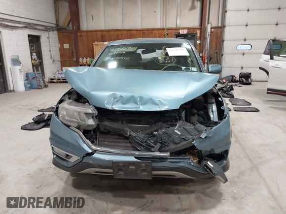 2015 Honda CR-V EX with VIN 2HKRM4H57FH614090, listed as a IAAI auction lot 41940788 with 334,805 mi miles and . Bid and sale history available at DreamBid. Image 13.