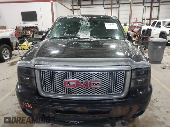 2011 GMC Sierra 1500 Denali z VIN 3GTP2XE2XBG128854, wystawiony jako IAAI lot #41606670 z przebiegiem 150 556 mil mil oraz . Historia ofert i sprzedaży dostępna na DreamBid. Obrazek 12.