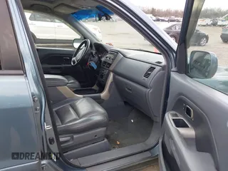 2006 Honda Pilot EX-L with VIN 2HKYF18566H517113, listed as a IAAI auction lot 41917755 with 180,398 mi miles and . Bid and sale history available at DreamBid. Image 5.