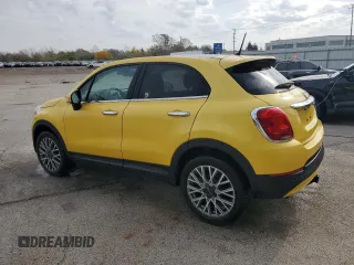 2017 FIAT 500X Lounge z VIN ZFBCFYDB9HP615416, wystawiony jako Copart lot #74811234 z przebiegiem 63 523 mil mil oraz Czysty tytuł • Clean title. Historia ofert i sprzedaży dostępna na DreamBid. Obrazek 2.