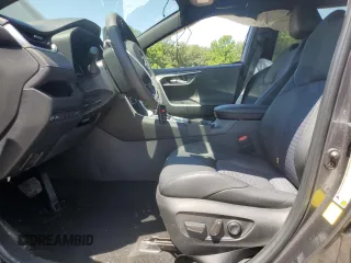 2023 Toyota RAV4 Hybrid XSE with VIN 2T3E6RFV9PW039963, listed as a Copart auction lot 57594335 with 27,486 mi miles and Salvage title. Bid and sale history available at DreamBid. Image 7.