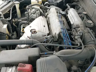 1996 Toyota Camry DX with VIN 4T1BG12K8TU777026, listed as a IAAI auction lot 43000116 with 222,952 mi miles and . Bid and sale history available at DreamBid. Image 12.