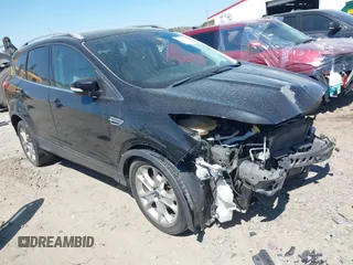 2015 Ford Escape Titanium with VIN 1FMCU0J91FUB36973, listed as a IAAI auction lot 41889560 with 93,445 mi miles and . Bid and sale history available at DreamBid. Image 1.