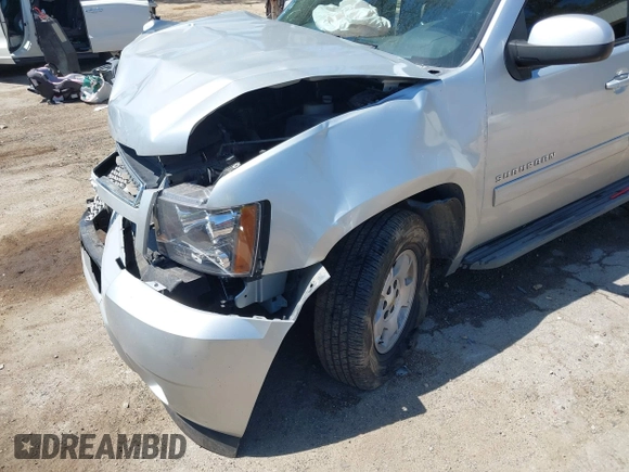 2013 Chevrolet Suburban LT with VIN 1GNSCJE06DR138925, listed as a IAAI auction lot 42008011 with 236,244 mi miles. Bid and sale history available at carsss.com. Image 6.