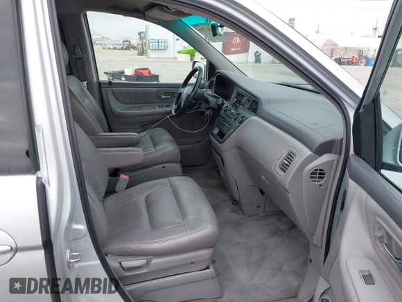 2003 Honda Odyssey EX-L with VIN 5FNRL18943B030373, listed as a IAAI auction lot 41867289 with 179,718 mi miles and . Bid and sale history available at DreamBid. Image 5.