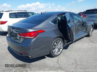 2018 Genesis G80 3.8L z VIN KMHGN4JEXJU283935, wystawiony jako IAAI lot #41750441 z przebiegiem 70 165 mil mil oraz . Historia ofert i sprzedaży dostępna na DreamBid. Obrazek 4.