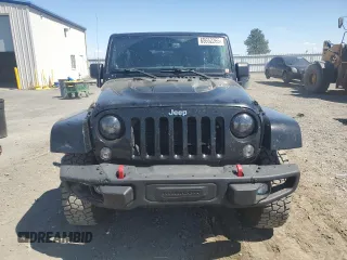 2014 Jeep Wrangler Unlimited Rubicon с VIN 1C4BJWFG7EL119344, выставлен на аукционе Copart как лот 65652265 с пробегом 150 934 миль миль и Списание • Salvage title. История ставок и продаж доступна на DreamBid. Изображение 5.