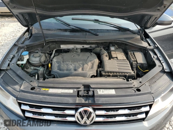 2018 Volkswagen Tiguan S with VIN 3VV0B7AXXJM131760, listed as a Copart auction lot 58831685 with 124,431 mi miles and Salvage title. Bid and sale history available at DreamBid. Image 12.