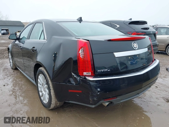 2012 Cadillac CTS with VIN 1G6DC5E54C0146550, listed as a IAAI auction lot 41735872 with 119,784 mi miles and . Bid and sale history available at DreamBid. Image 3.