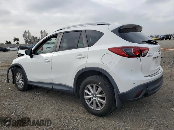 2016 Mazda CX-5 Touring with VIN JM3KE2CY5G0838663, listed as a Copart auction lot 47658065 with 51,470 mi miles and Salvage Title. Bid and sale history available at carsss.com. Image 2.