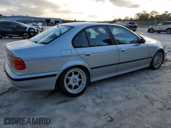 1998 BMW 5 Series 540i with VIN WBADE5327WBV93735, listed as a Copart auction lot 85789824 with 377,552 mi miles and Salvage Title. Bid and sale history available at DreamBid. Image 3.